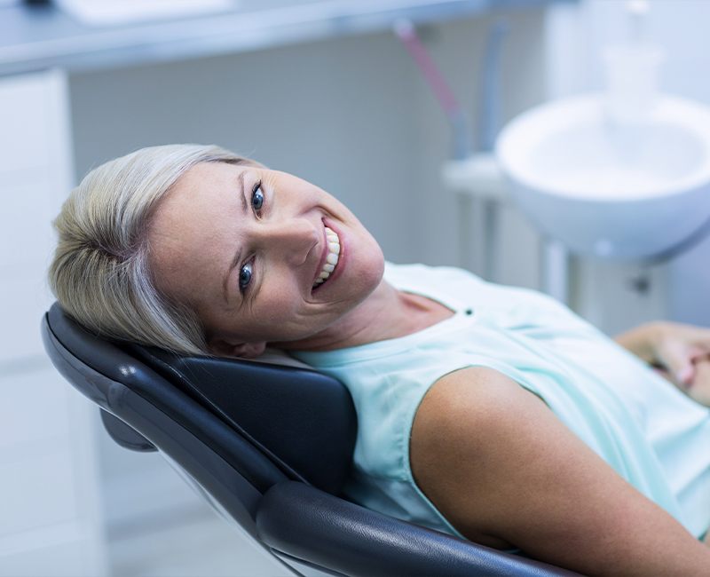 Woman smiling in dental chair