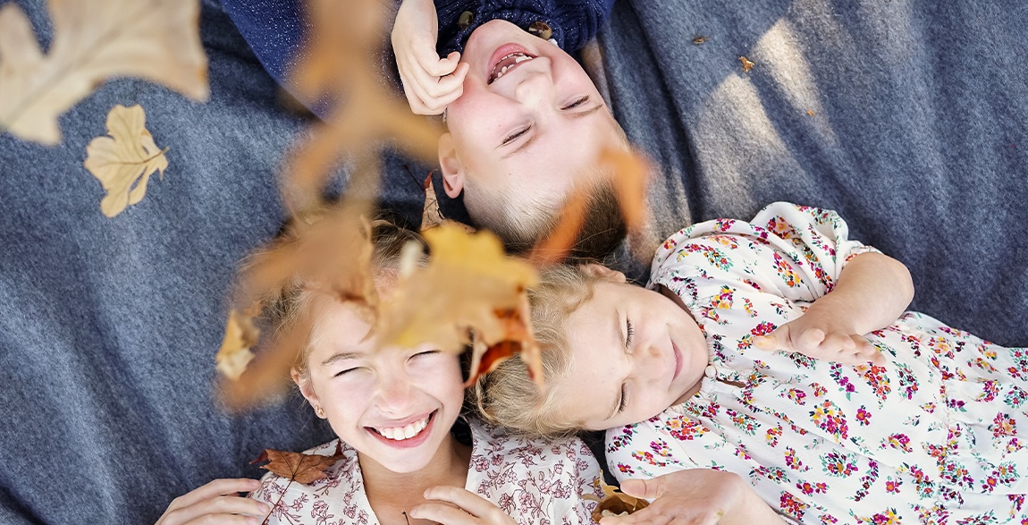 Kids laughing together after children's dentistry visit