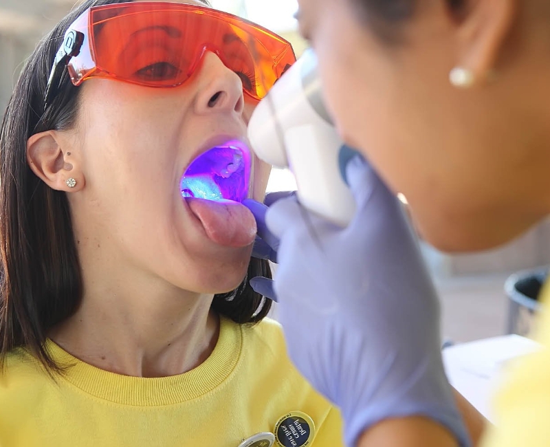 Patient receiving oral cancer screening