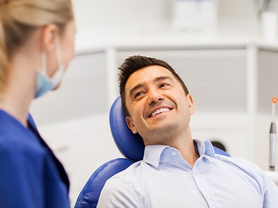 Man smiling at the dental office