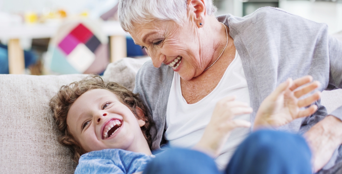 Older woman with dentures laughing