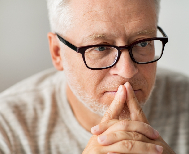 Man considering options to replace missing teeth