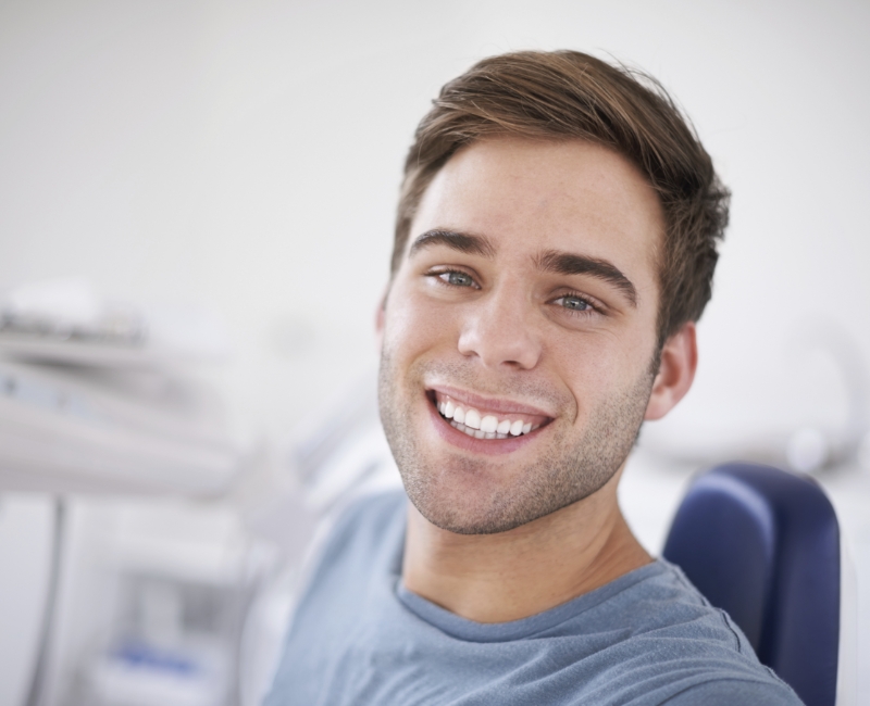 Man smiling during dental appointment