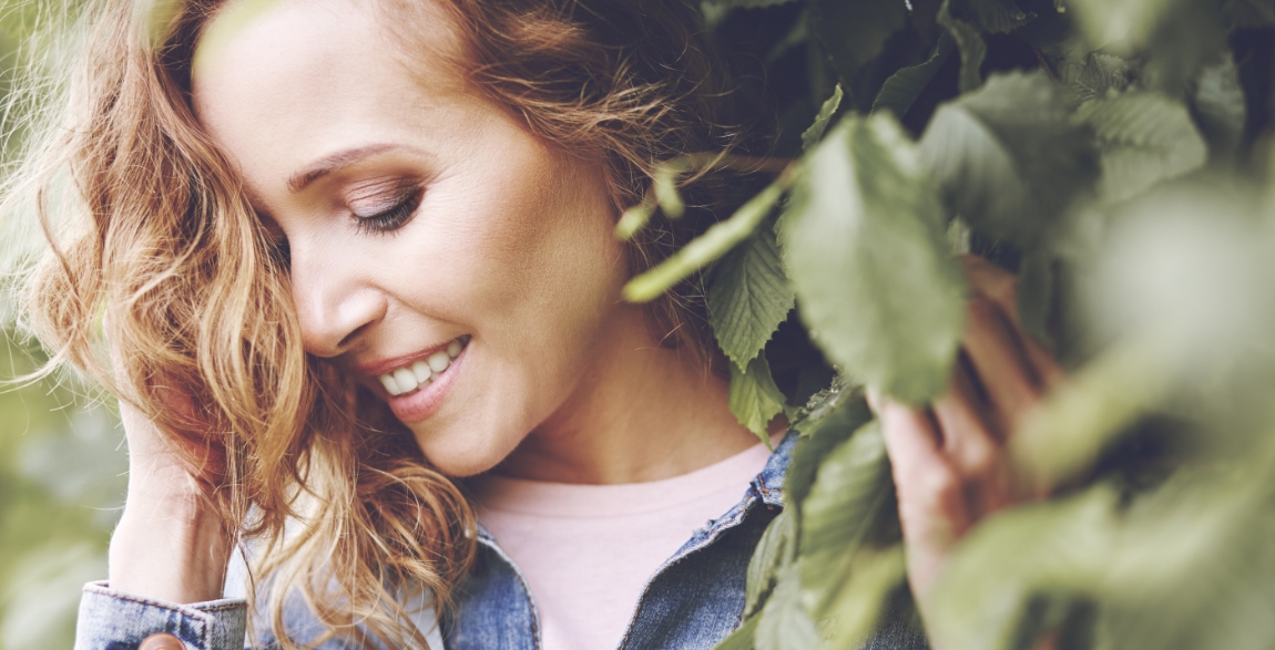 Woman with gorgeous smile after cosmetic dentistry