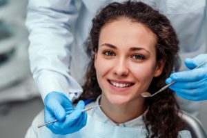 smiling woman at her dental checkup 